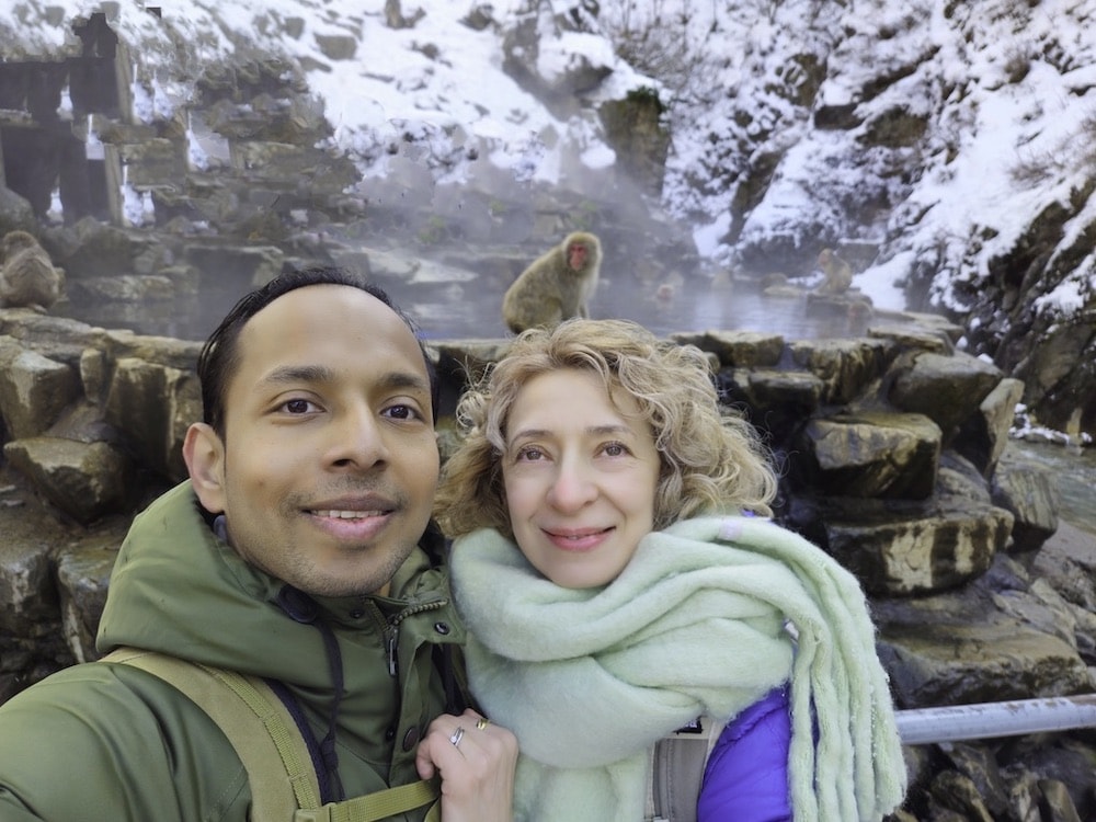 Posing in front of the snow monkeys 