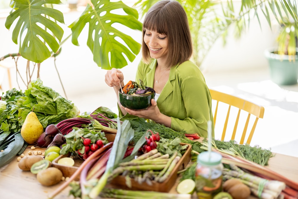 Veganism vs. Plant-Based - What's the Difference? 4 A young woman following plant-based lifestyle